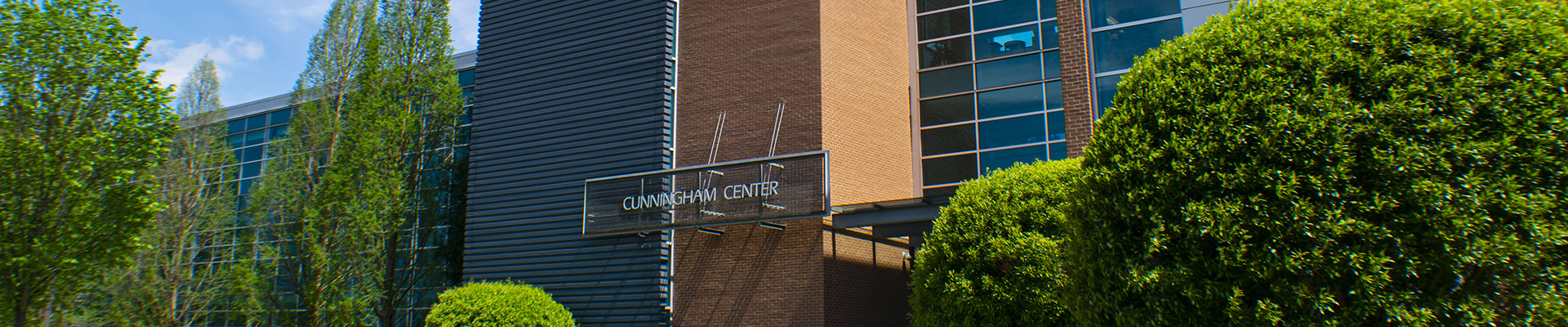 a large building with the words Cunningham Center on it