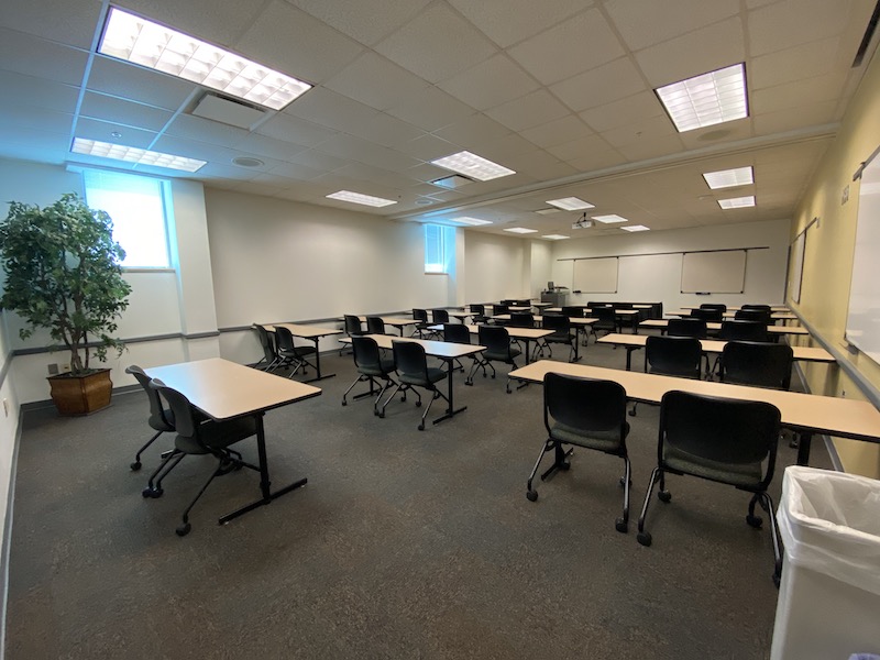 Meeting Room 209/210 with tables and chairs